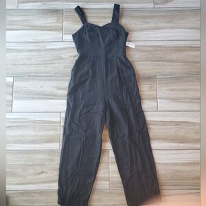 Black Relaxed Fit Jumpsuit with V-Neck and Thin Straps